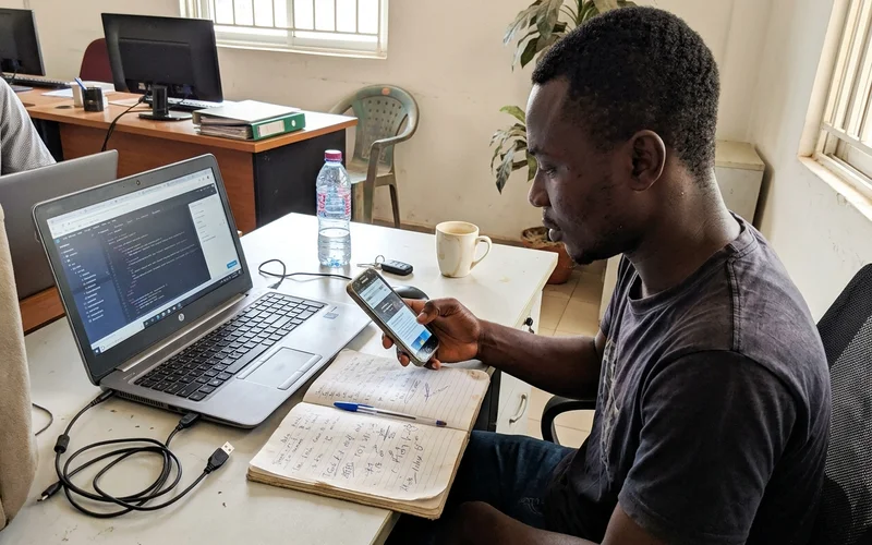 Designer testing a client website on an Android phone