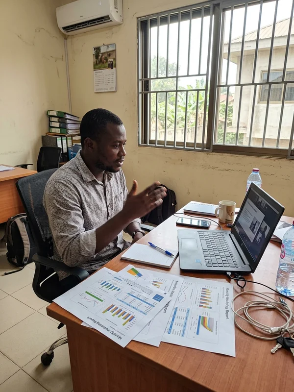 Account manager walking a client through the monthly report on a video call