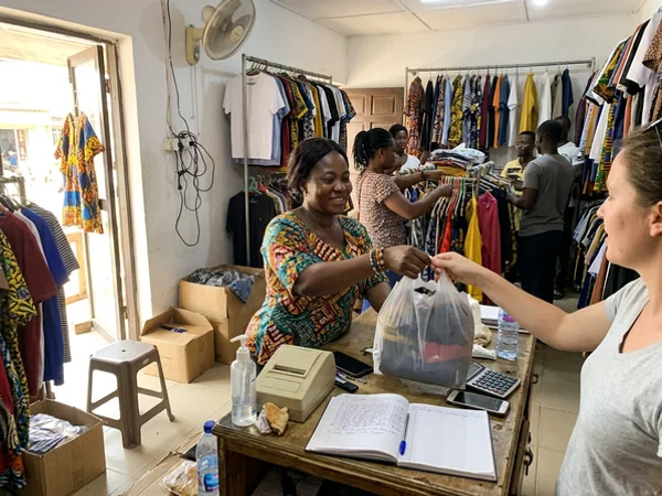 Boutique owner asking a happy customer for a Google review